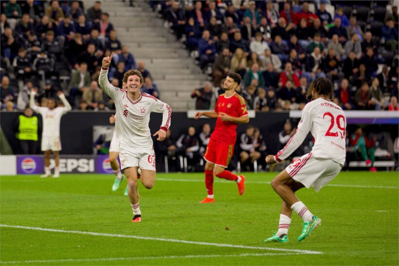 Lewis Koumas celebrates for Liverpool against LASK with Bradley Barcola nearby