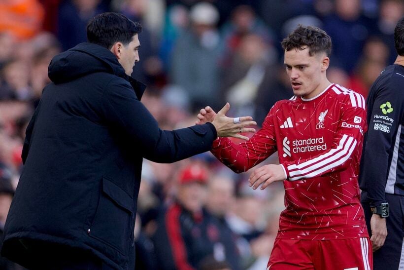 Liverpool manager Andoni Iraola greets Florian Wirtz as he leaves the pitch against Brighton